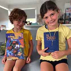 Little girl holding the book