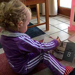 Little girl holding the book